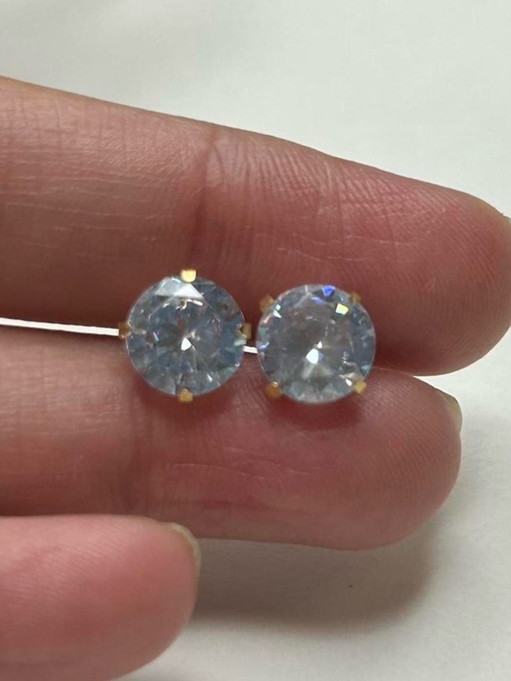 Sparkling Clear CZ Stud Earrings in Gold Prong